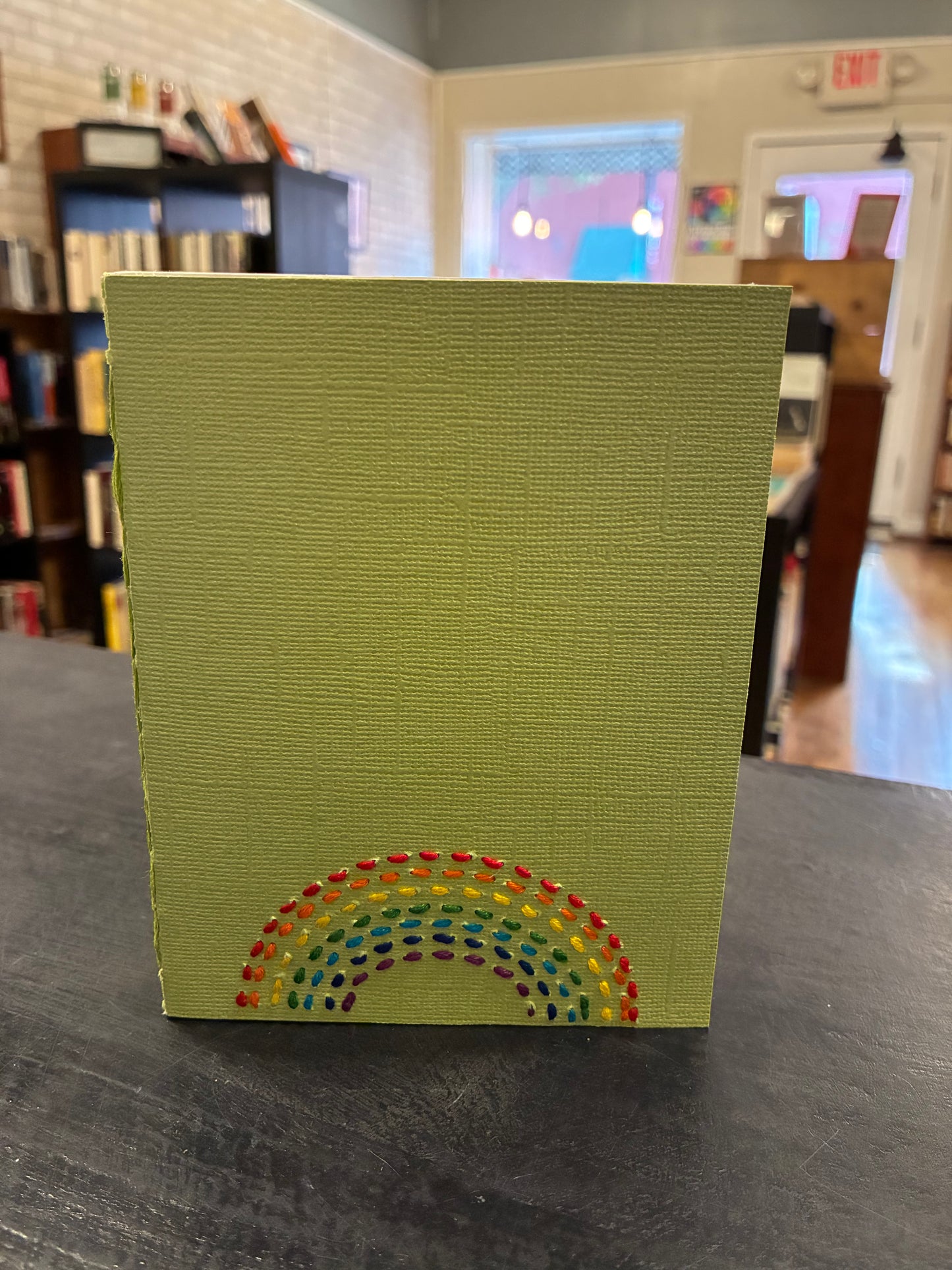 Carmen’s little Rainbow notebook. green
