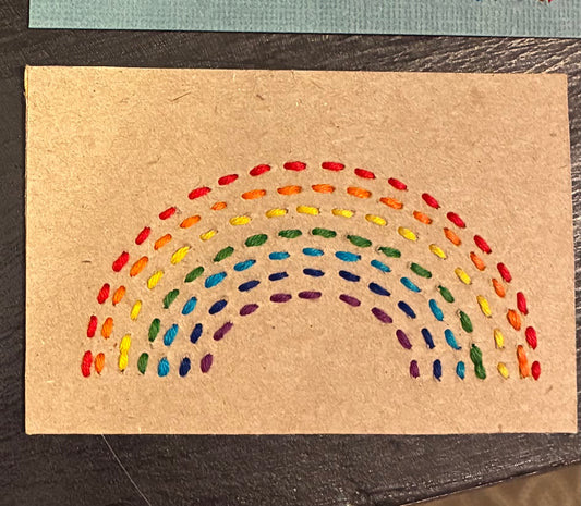 Carmen’s tan rainbow bookmark