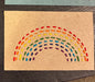 Carmen’s tan rainbow bookmark