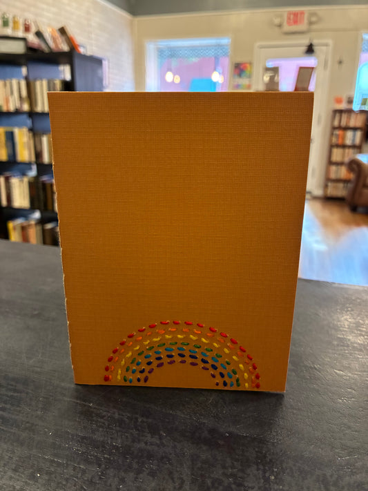 Carmen’s little Rainbow notebook. Orange