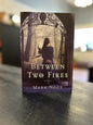 Between Two Fires -  Mark Noce